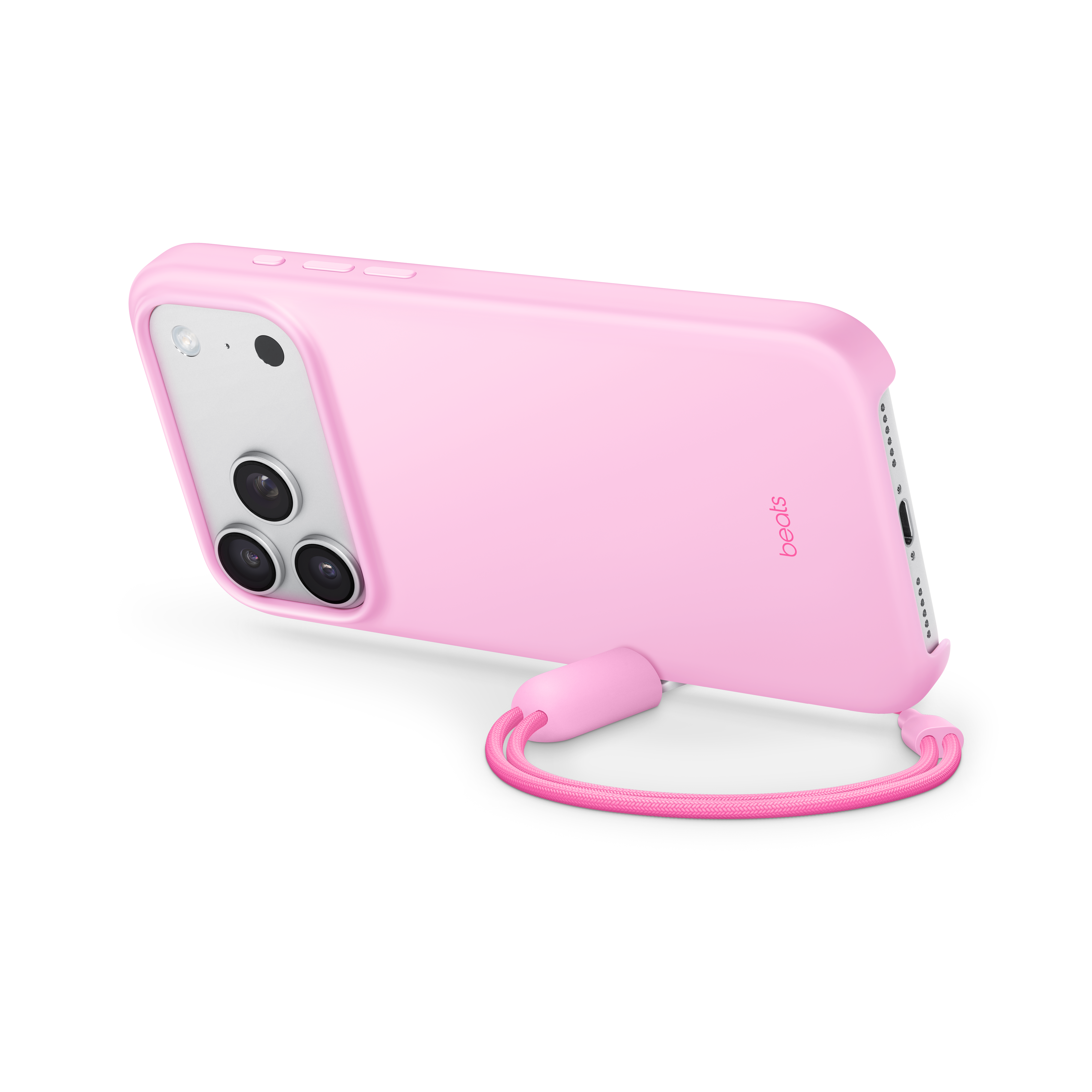 Custodia rosa per telefono con cordino. Il telefono ha tre obiettivi e il marchio Beats è visibile.