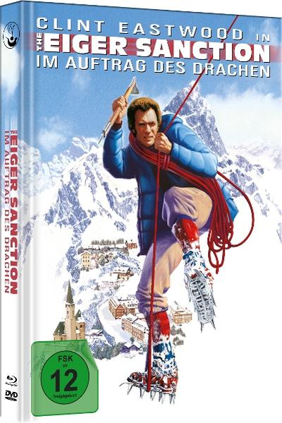 Filmcover: Clint Eastwood klettert einen Berg. Schneebedeckte Berge und eine Stadt im Hintergrund. Text: The Eiger Sanction.