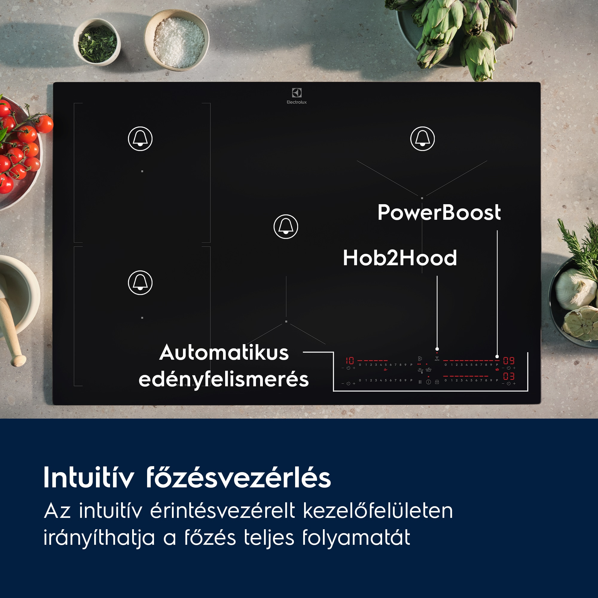 Fekete indukciós főzőlap zöldségekkel, fűszernövényekkel és tálakkal. PowerBoost és Hob2Hood technológiával.