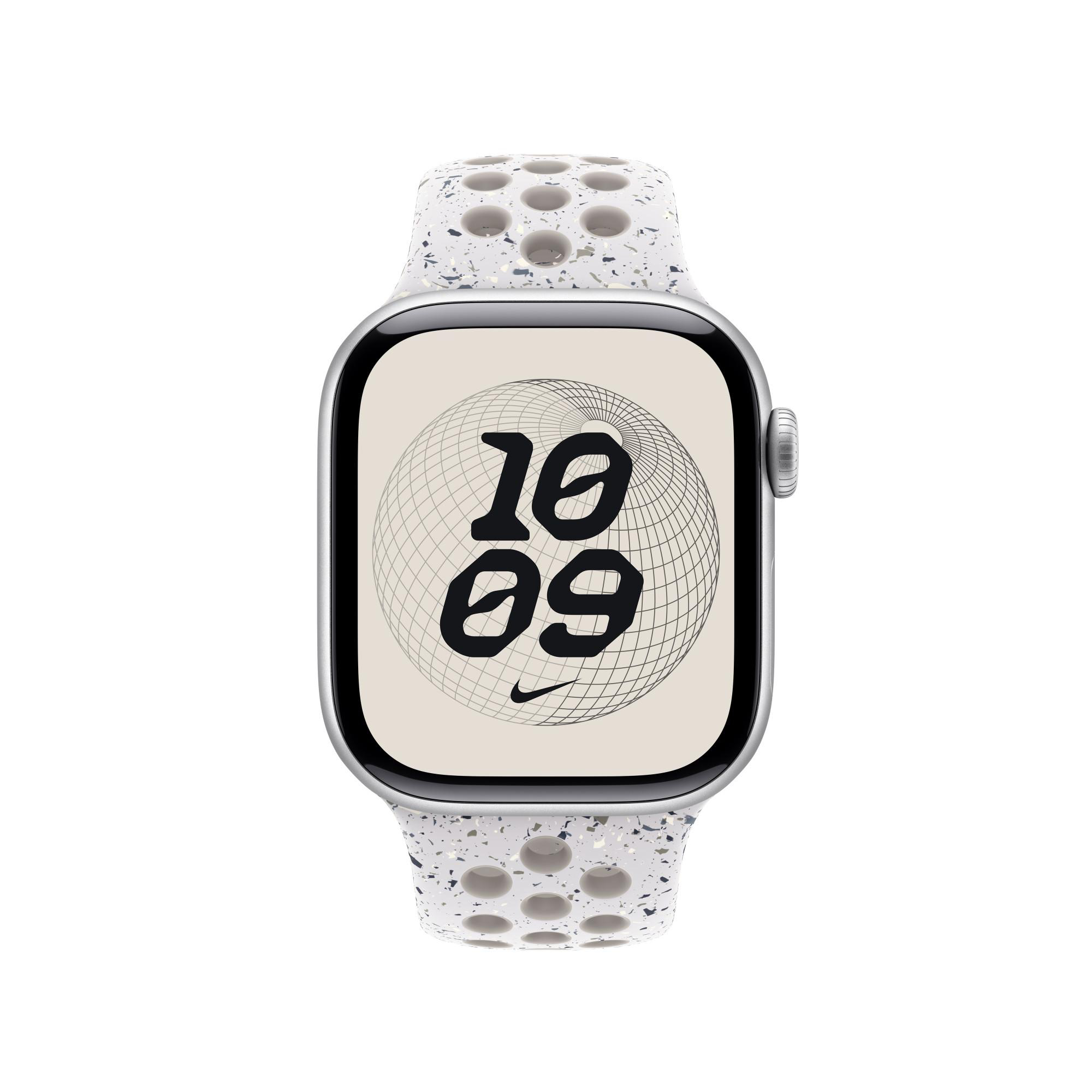 Silberne Apple Watch mit weißem, gesprenkeltem Armband. Das Zifferblatt zeigt 10:09 mit einem Nike-Logo.