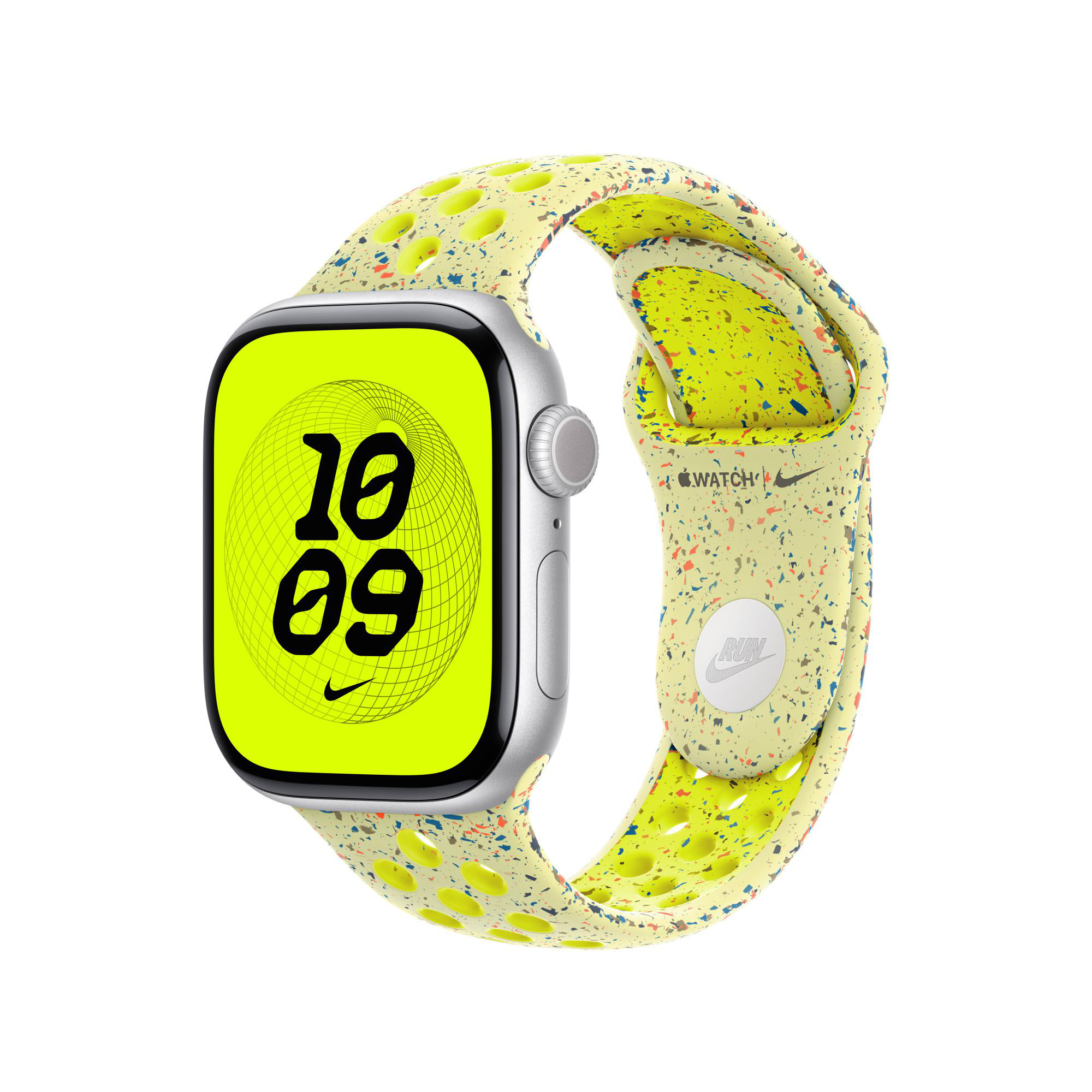 Apple Watch mit gelbem Armband, zeigt '10 09' auf einem neongrünen Bildschirm. Das Armband hat ein gesprenkeltes Design.