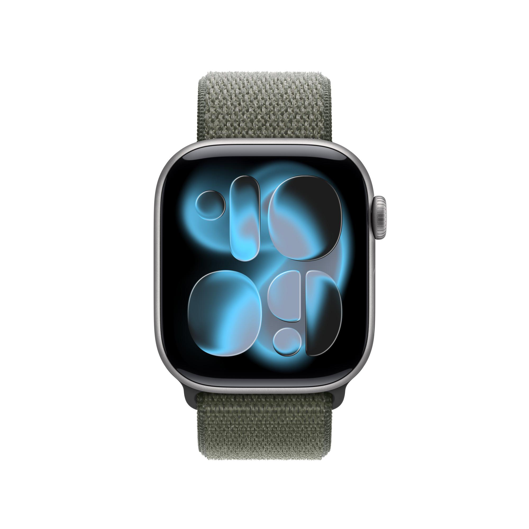 Eine Apple Watch mit grünem Stoffarmband. Das Zifferblatt zeigt die Zeit mit blau leuchtenden Formen.