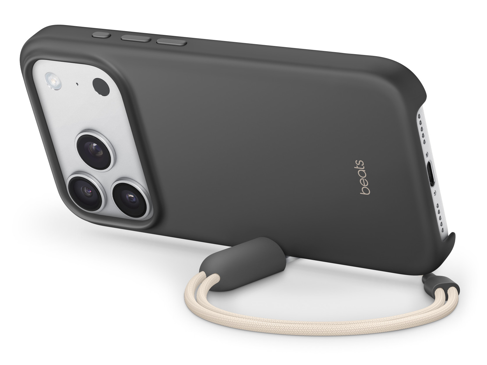 Czarny telefon z paskiem. Telefon ma srebrną wypukłość aparatu z trzema obiektywami. Pasek jest beżowy.