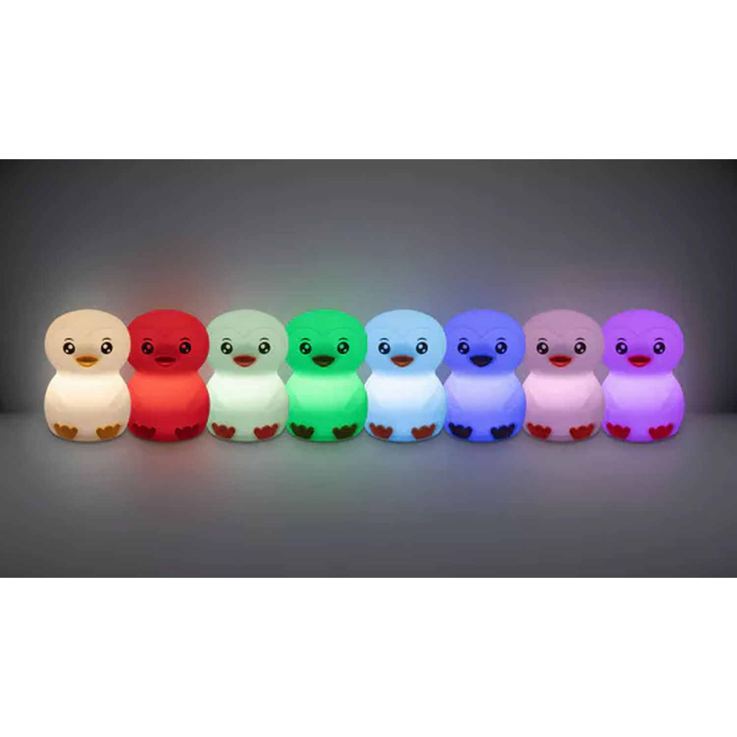 Seven penguin-shaped lights, each a different color, arranged in a row. They have cute faces and are glowing. The background is grey.