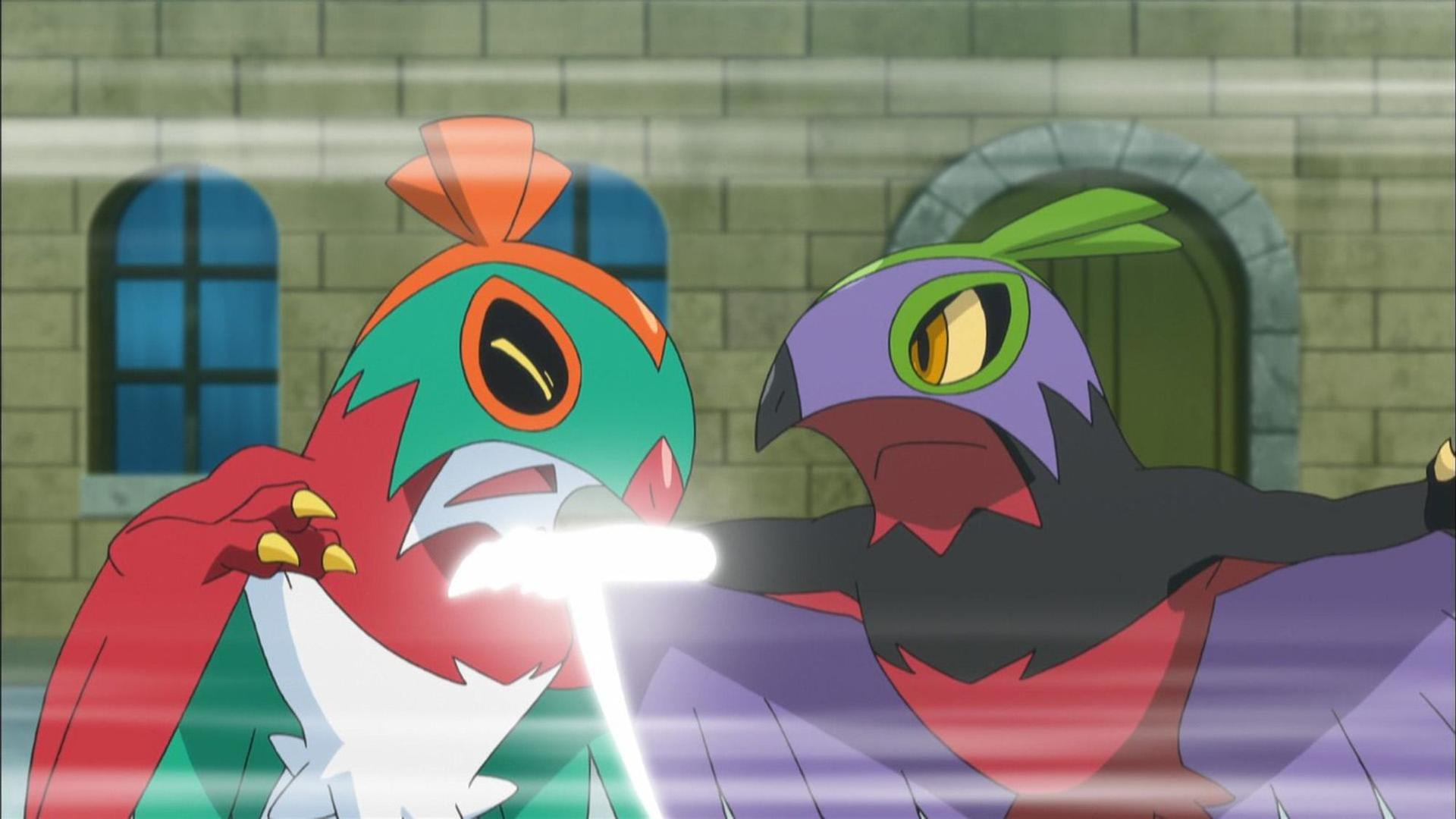 Zwei Pokémon mit roten und violetten Federn kämpfen mit Lichtstrahlen.