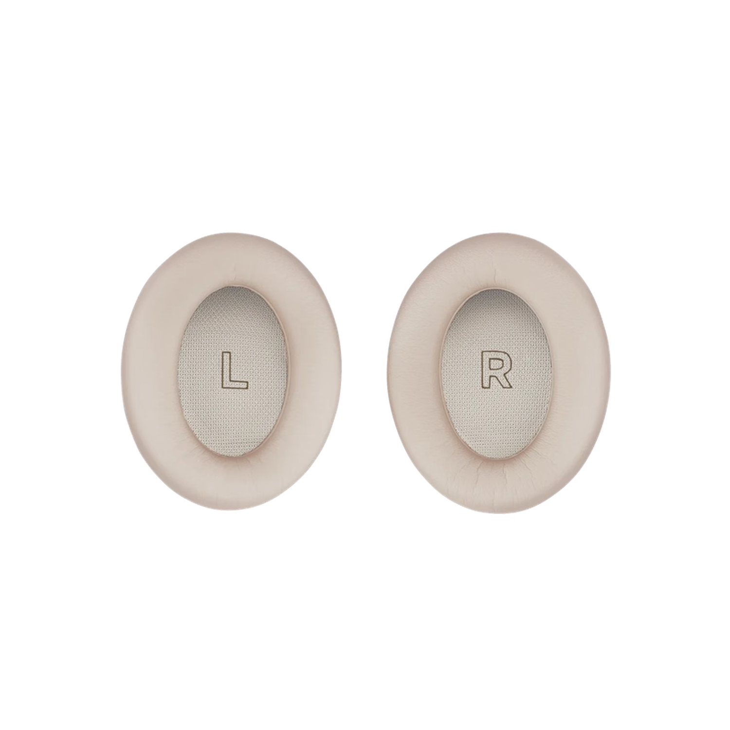 Two beige headphone ear cushions on a black background. One has an 'L' and the other an 'R' printed in gray.