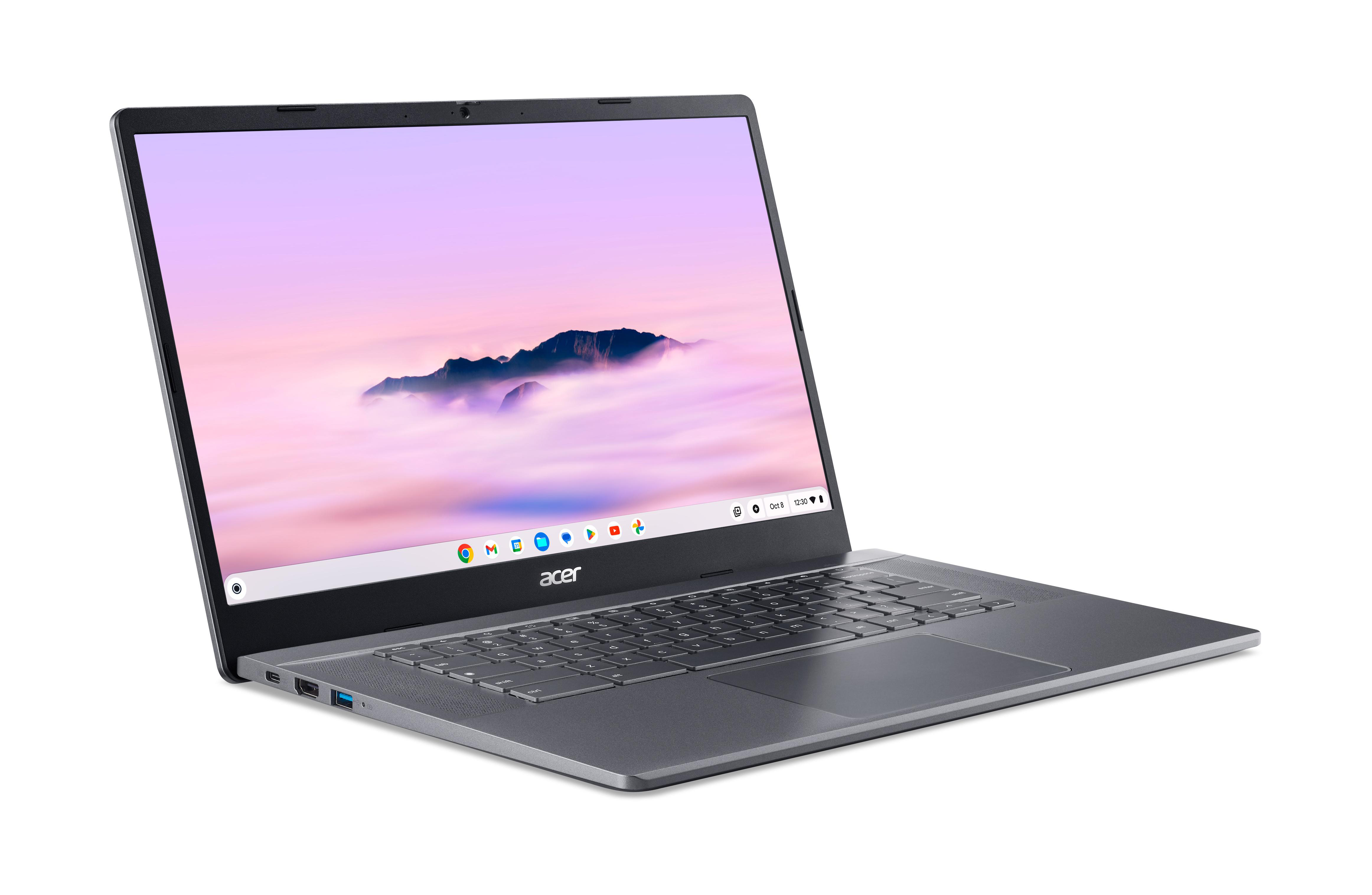 Ein silbernes Acer Chromebook-Laptop ist geöffnet. Der Bildschirm zeigt einen wolkenverhangenen Himmel. Tastatur und Trackpad sind sichtbar.