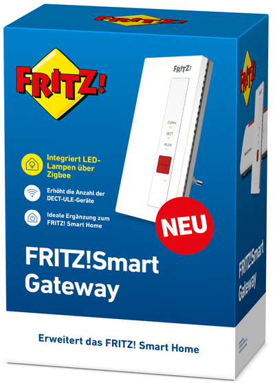 Boîte de FRITZ! Smart Gateway. Elle est bleue avec une image de passerelle blanche, un autocollant rouge 'NEU' et du texte en allemand.