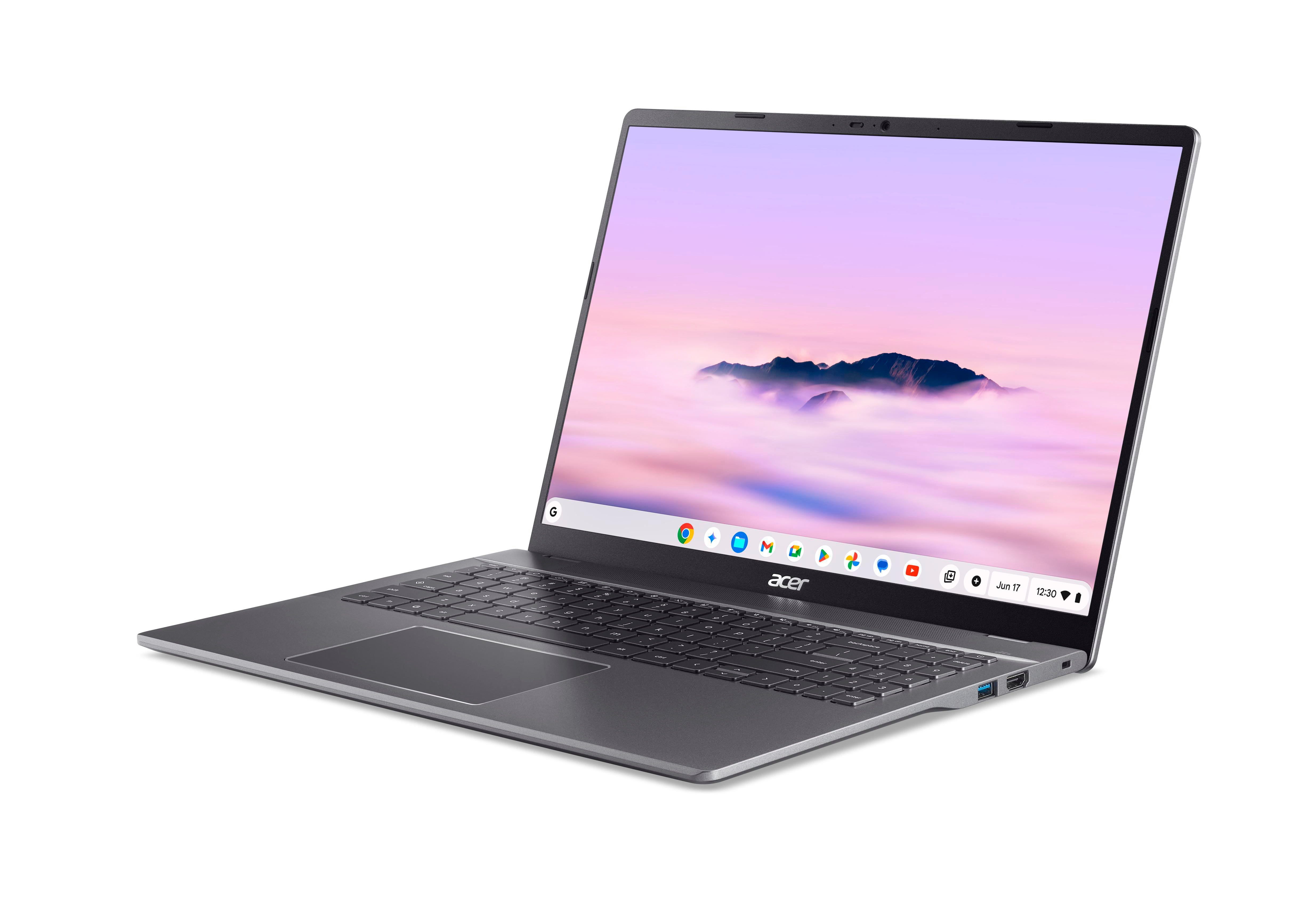Ein graues Acer Chromebook-Laptop ist geöffnet und zeigt eine Bergszene auf dem Bildschirm. Die Tastatur ist sichtbar.
