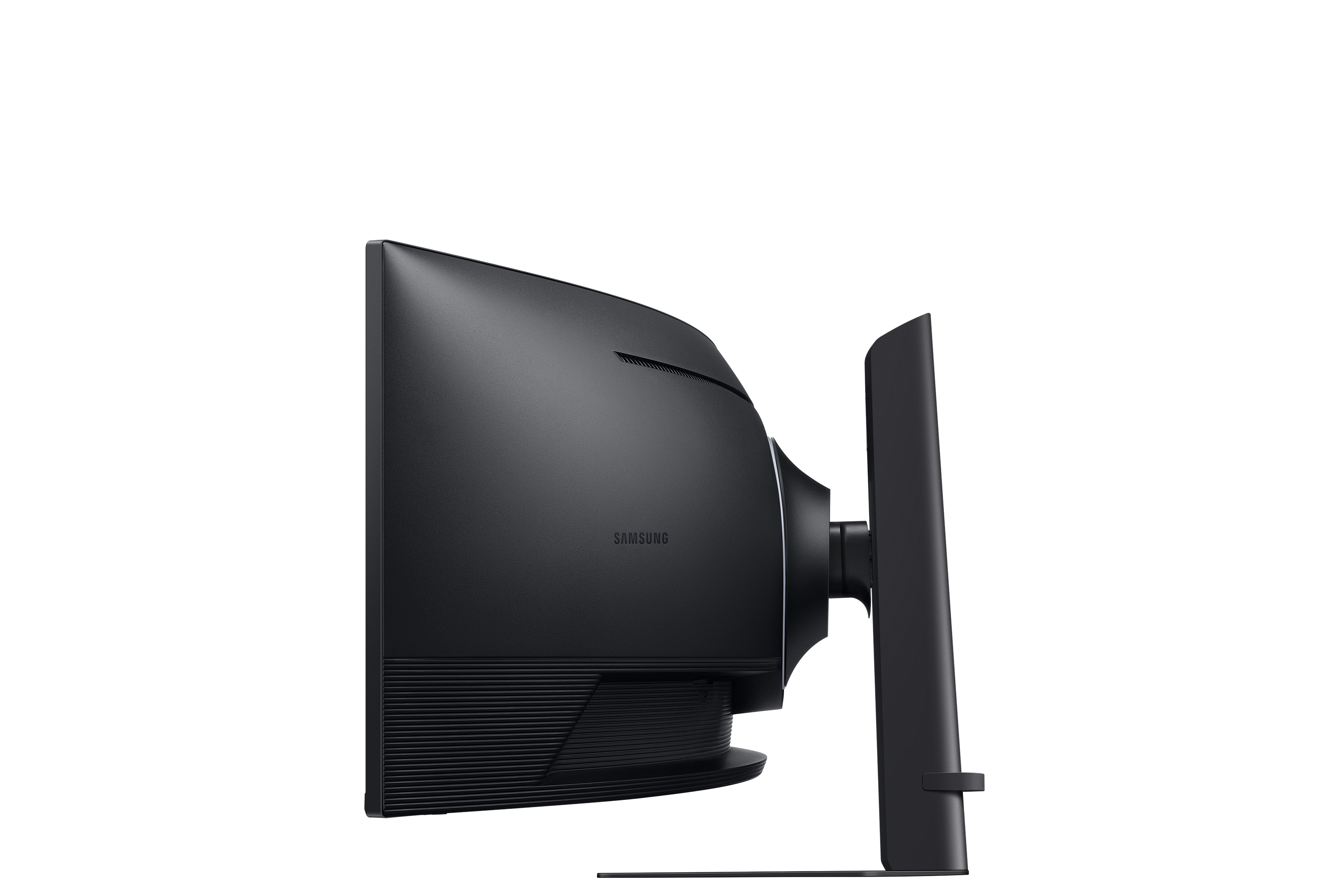 Back view of a black Samsung monitor with stand on a dark background.