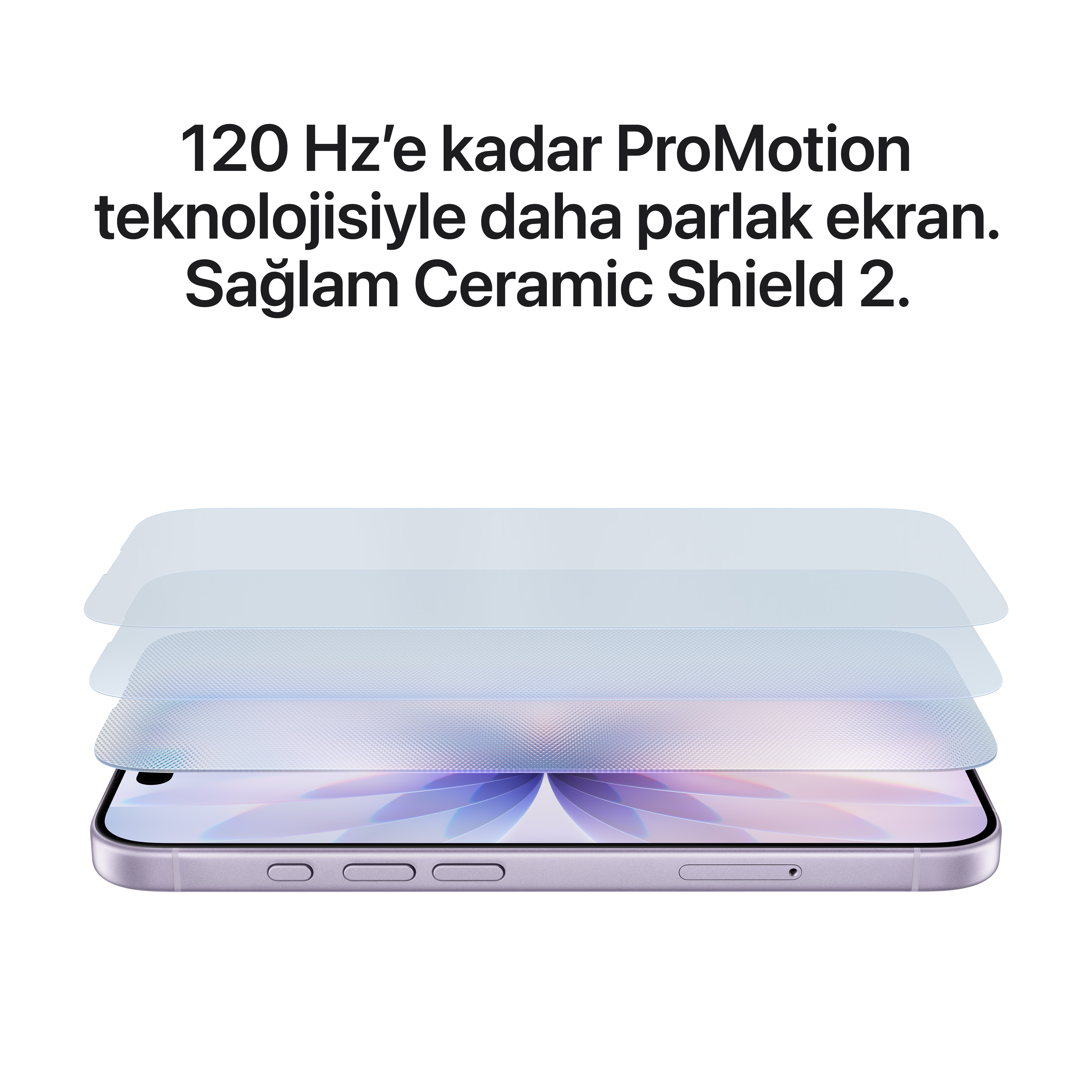 Ekran koruyuculu bir akıllı telefon. Türkçe metin. Telefon mor. Ekran çiçek deseni gösteriyor.