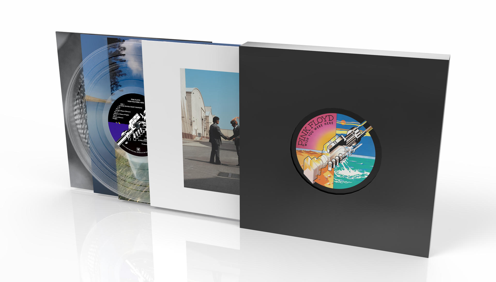Pink Floyds Album 'Wish You Were Here'. Eine klare Vinylplatte, Albumcover mit zwei Händeschüttelnden Männern und schwarzem Cover.