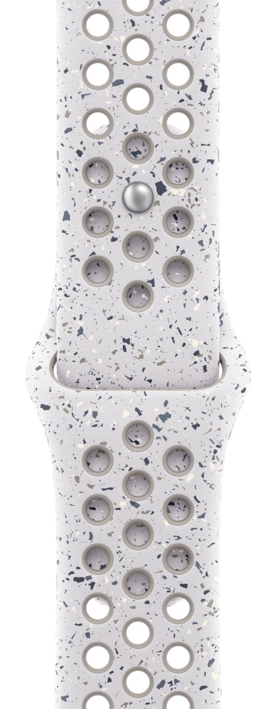 Biały pasek do Apple Watch z nakrapianym wzorem. Ma wiele otworów i srebrny pin. Pasek jest nakrapiany szarym i beżowym kolorem.