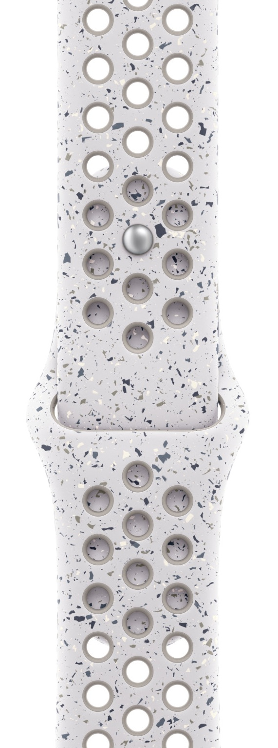 Biały pasek do zegarka z otworami i wzorem w plamki. Ma metalowe zapięcie i jest na czarnym tle.