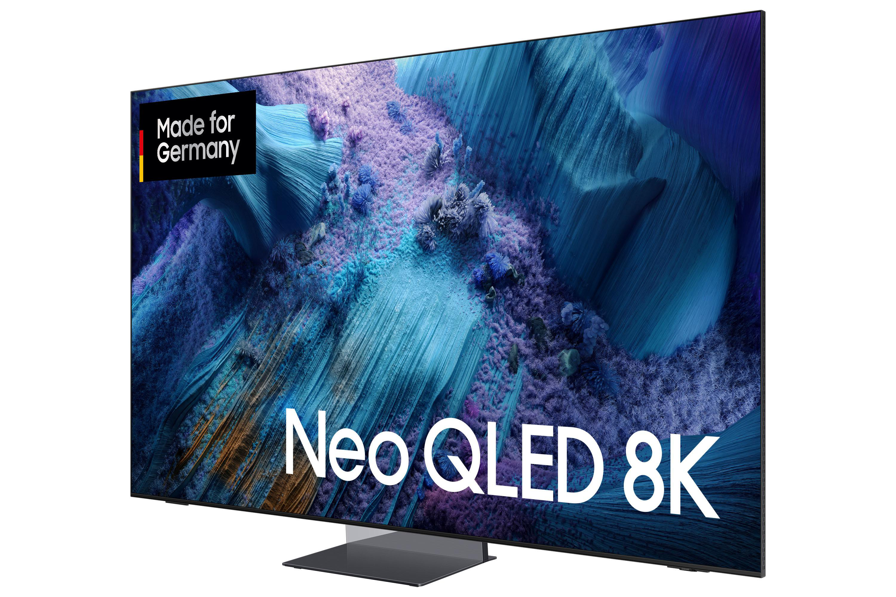 Ein Neo QLED 8K-Fernseher. Der Bildschirm zeigt ein farbenfrohes, abstraktes Bild. Er hat ein 'Made for Germany'-Logo.