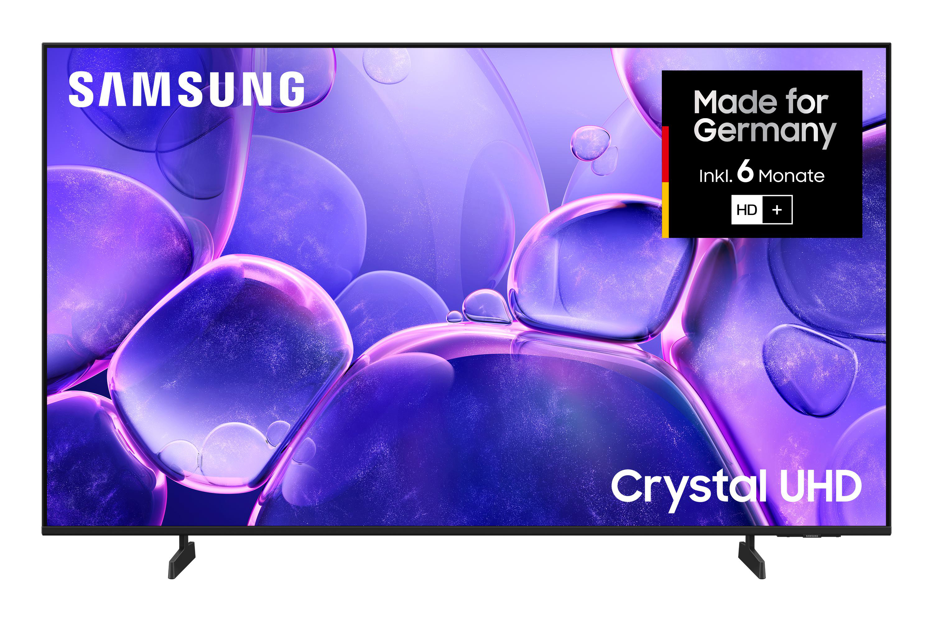 Samsung Crystal UHD-Fernseher. Der Bildschirm zeigt abstrakte lila Formen. Aufkleber Made for Germany oben rechts.