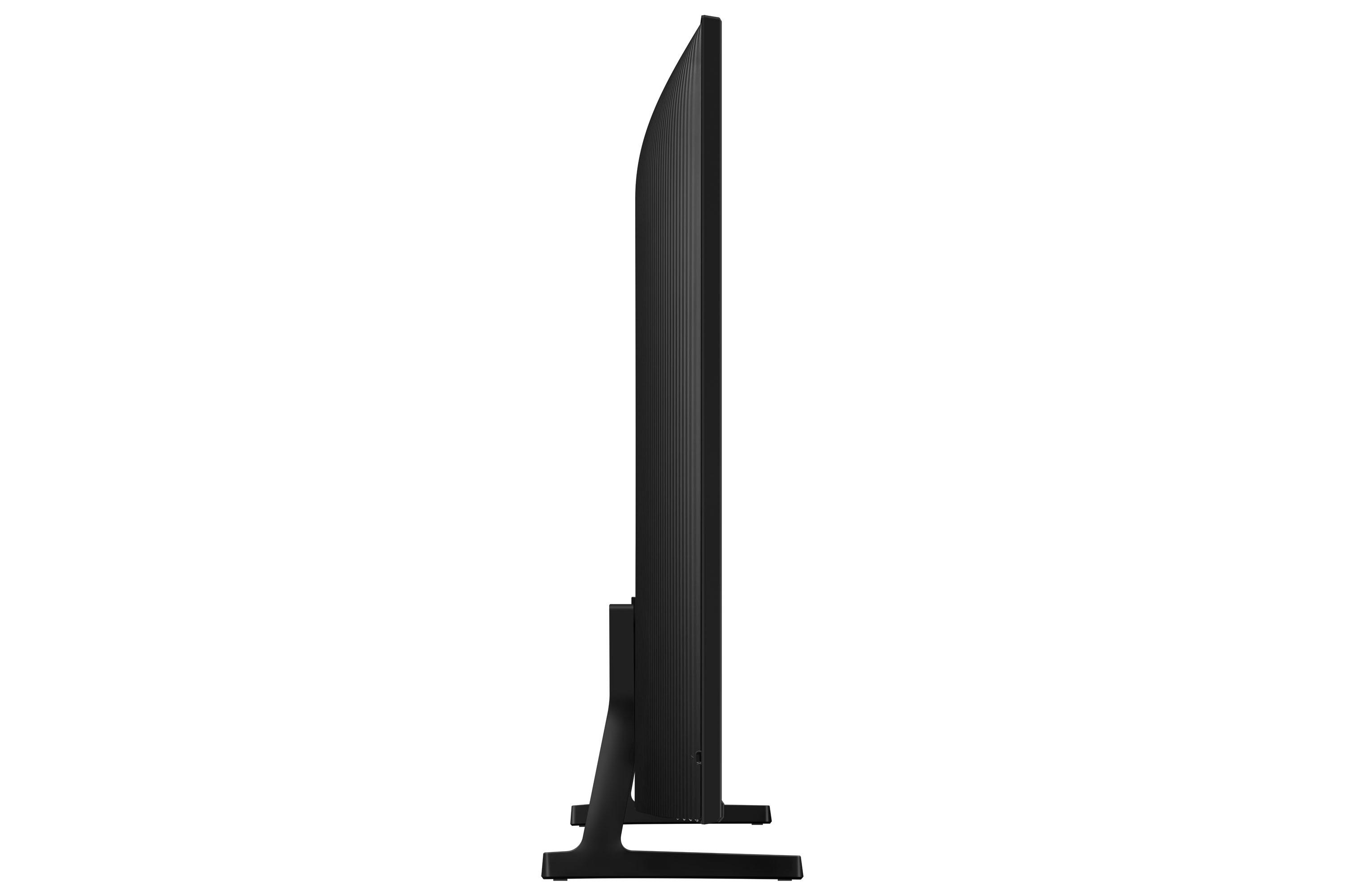 Ein schwarzer, schlanker Fernseher ist von der Seite zu sehen. Er steht auf einem schwarzen Ständer vor weißem Hintergrund.