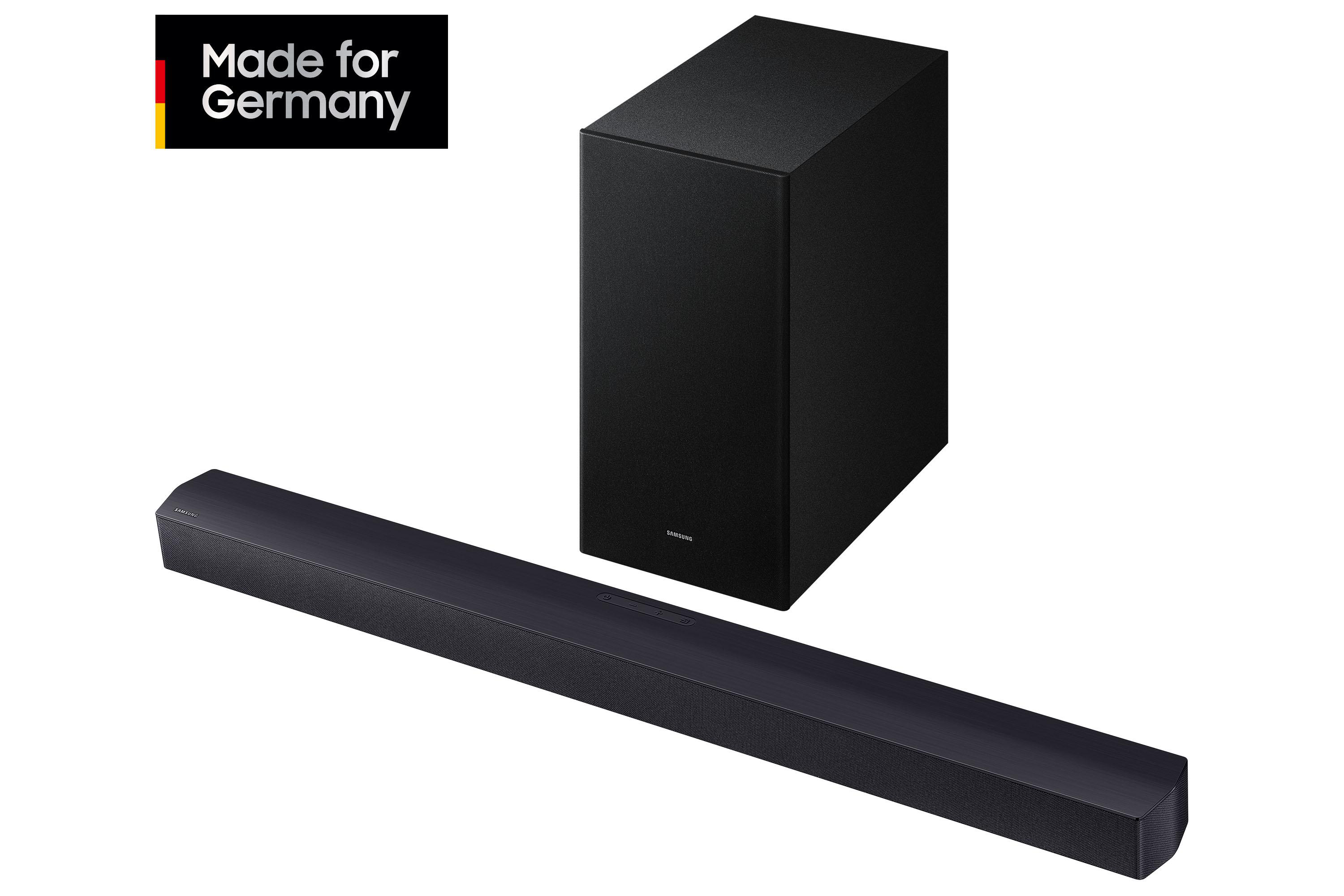 Ein schwarzes Soundbar- und Subwoofer-Set auf weißem Hintergrund, Made for Germany-Logo oben links.