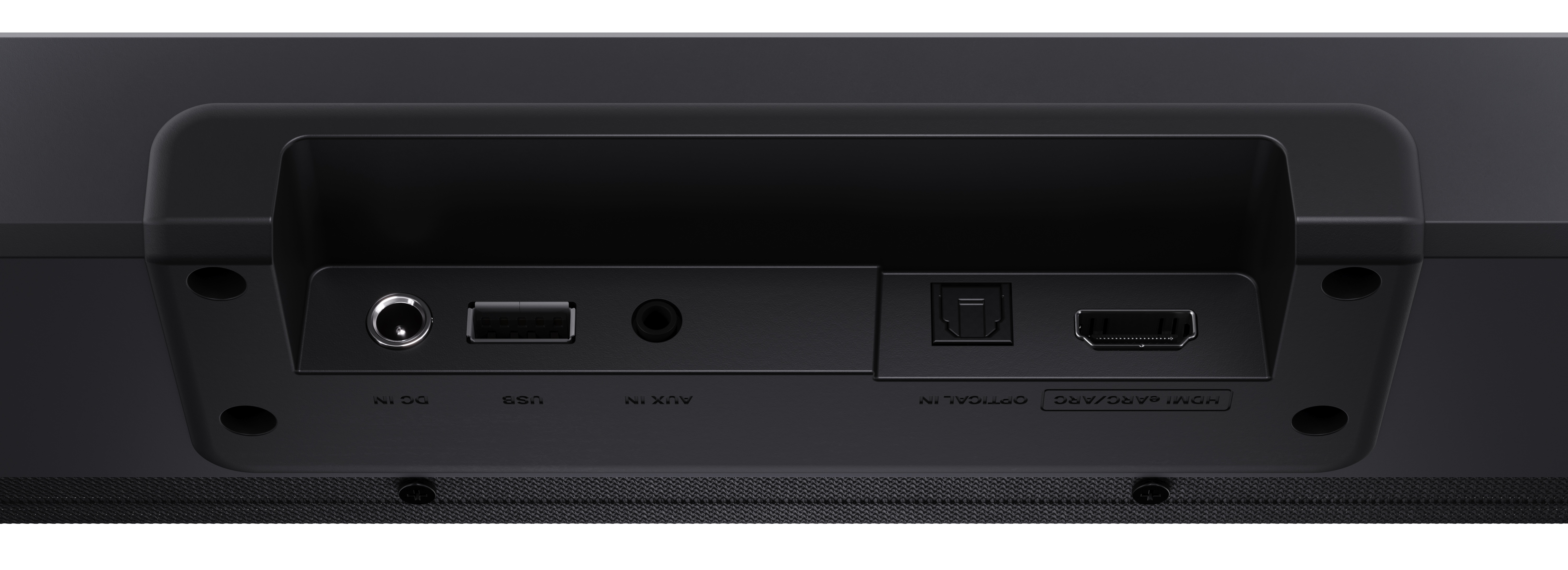 Zbliżenie tylnego panelu czarnego soundbaru. Porty: DC IN, USB, AUX IN, Optical IN i HDMI ARC.