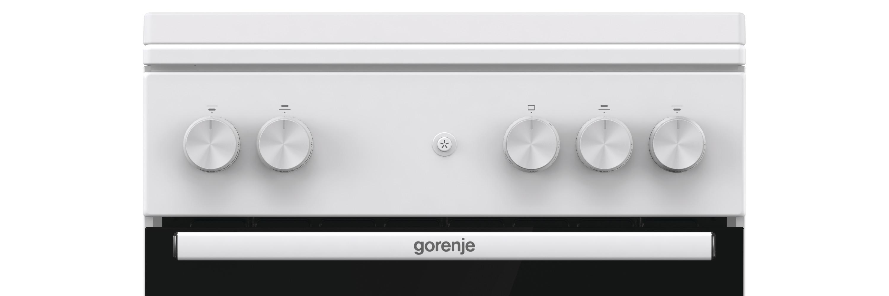 Eine weiße Gorenje-Ofenfront mit Drehknöpfen, einem Markenlogo und einem schwarzen unteren Teil.