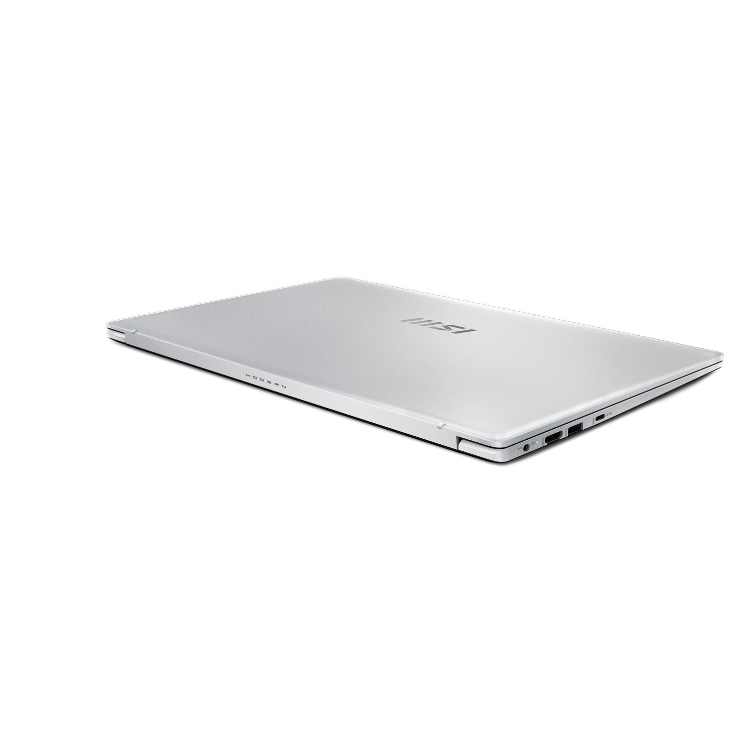 Silver laptop on white background. The laptop is closed, showing the top with a logo and the word 'MODERN'.