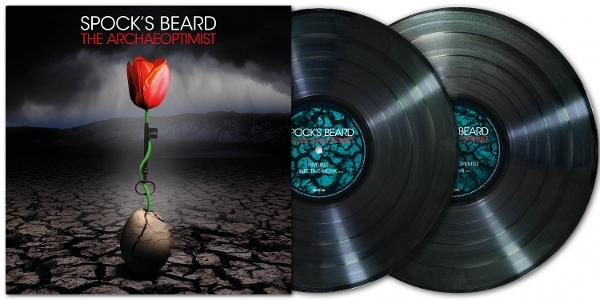 Albumcover mit einer roten Tulpe, die aus einem zerbrochenen Ei wächst, einem Schlüssel und zwei Schallplatten. Der Hintergrund ist eine rissige Erde.