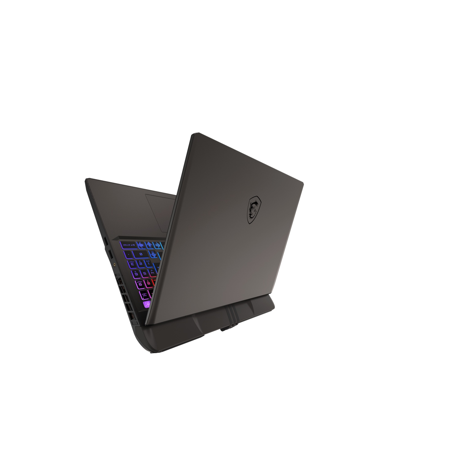 A black MSI laptop is slightly open. The keyboard has colorful lights. The background is pure white.