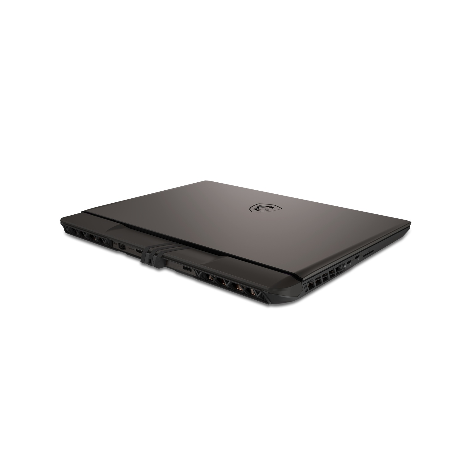 A closed, black laptop on a white surface. The laptop has the MSI logo and is positioned at an angle, showing its side ports.