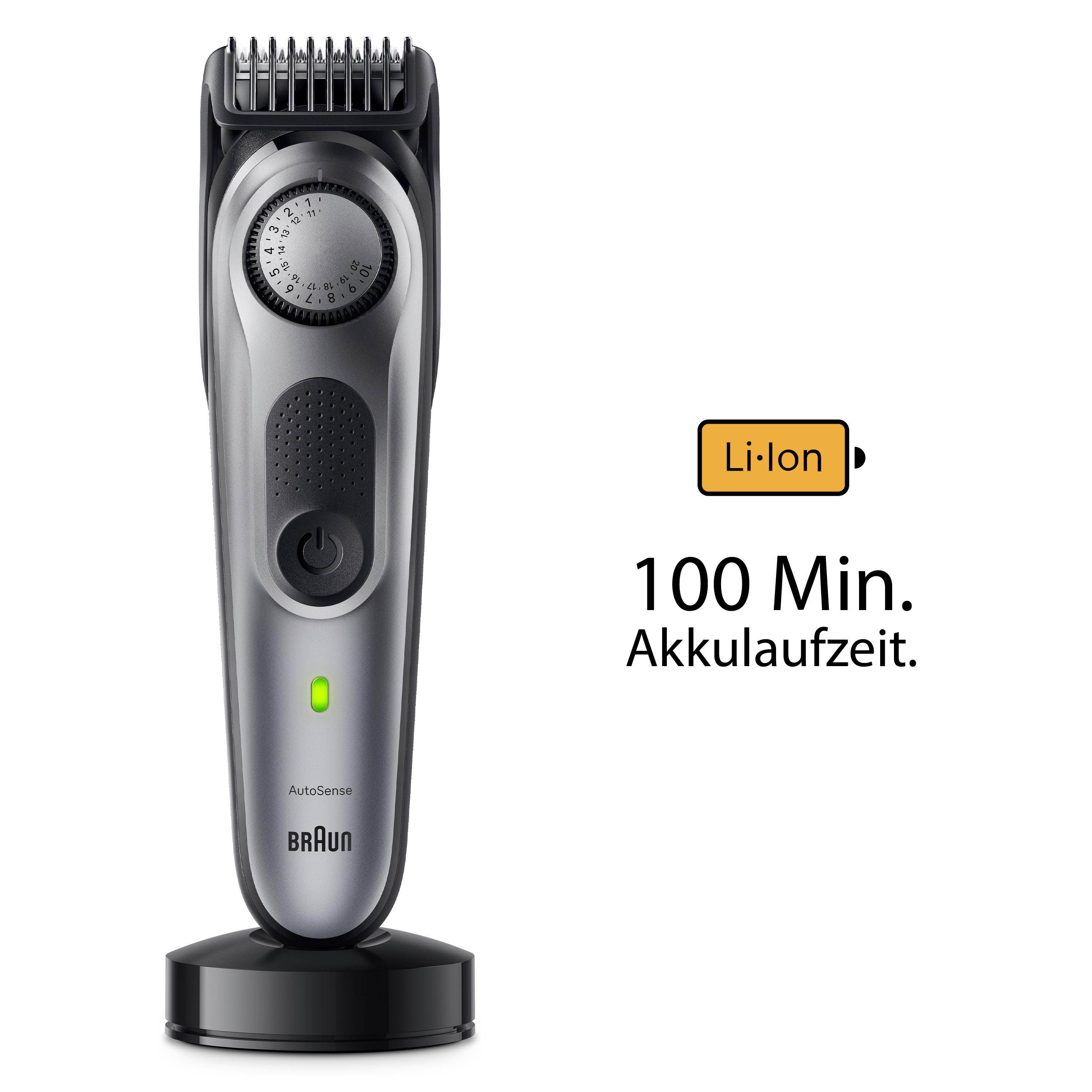 Ein silberner und schwarzer Braun Bartschneider auf schwarzer Basis. Er hat ein Ziffernblatt, einen Einschaltknopf und ein grünes Licht.