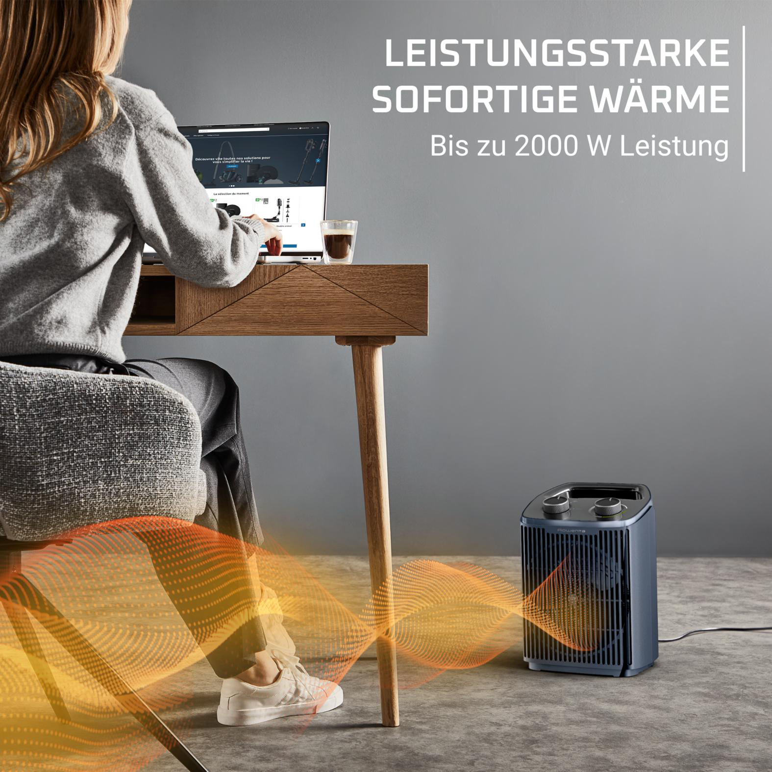 Frau am Schreibtisch mit Laptop, Kaffee und Heizung. Text: 'Sofortige Wärme'.