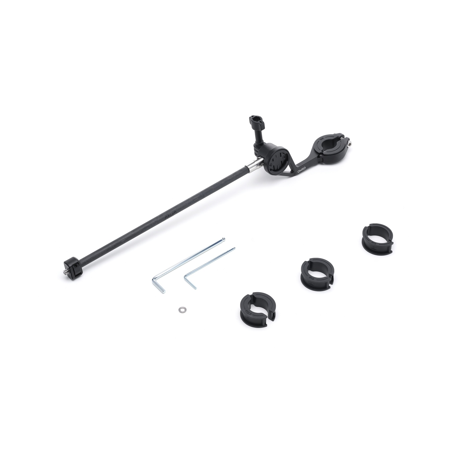 A bicycle handlebar accessory kit on a white surface. Includes a long black bar, clamps, Allen wrenches, and small parts.