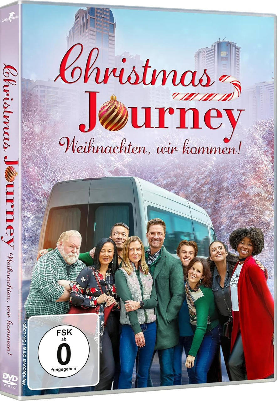 DVD-Cover: 'Christmas Journey'. Personengruppe vor einem Van. Roter Text, Weihnachtsdekorationen und schneebedeckte Bäume im Hintergrund.