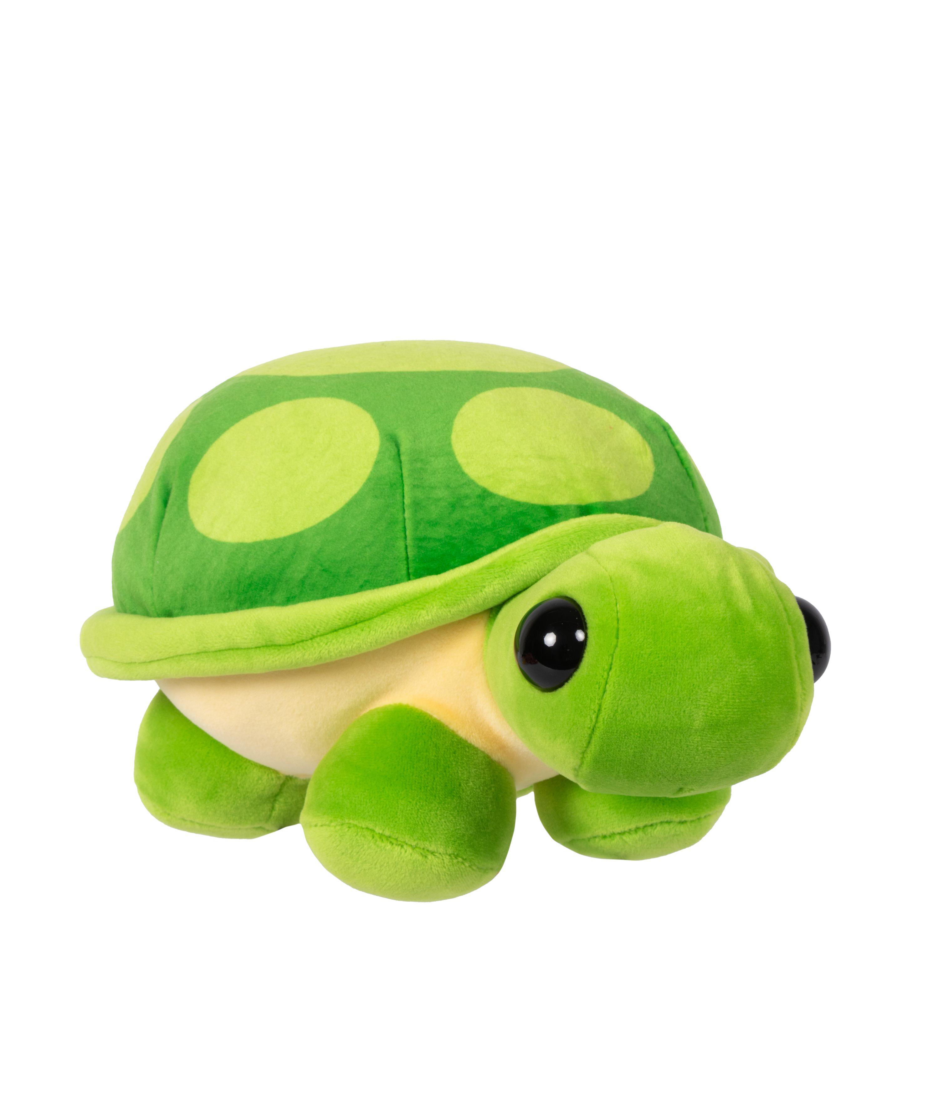 Ein Stofftier einer grünen Schildkröte mit schwarzen Augen auf weißem Hintergrund.
