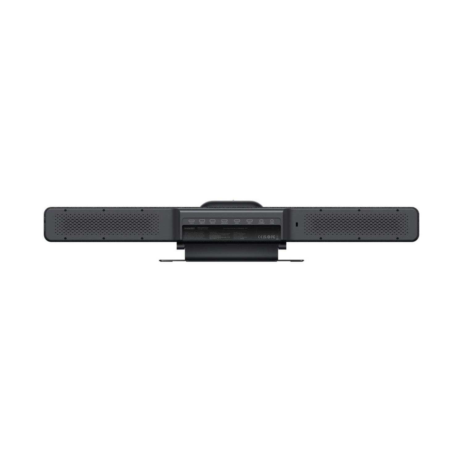 Un dispositivo rettangolare nero, forse una soundbar, è centrato. Presenta una superficie perforata e varie porte.