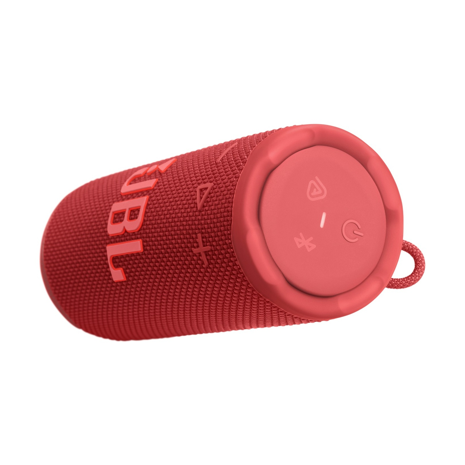 Un altoparlante JBL rosso è posizionato orizzontalmente. I pulsanti sono visibili sulla parte superiore. L'altoparlante ha una trama simile al tessuto.