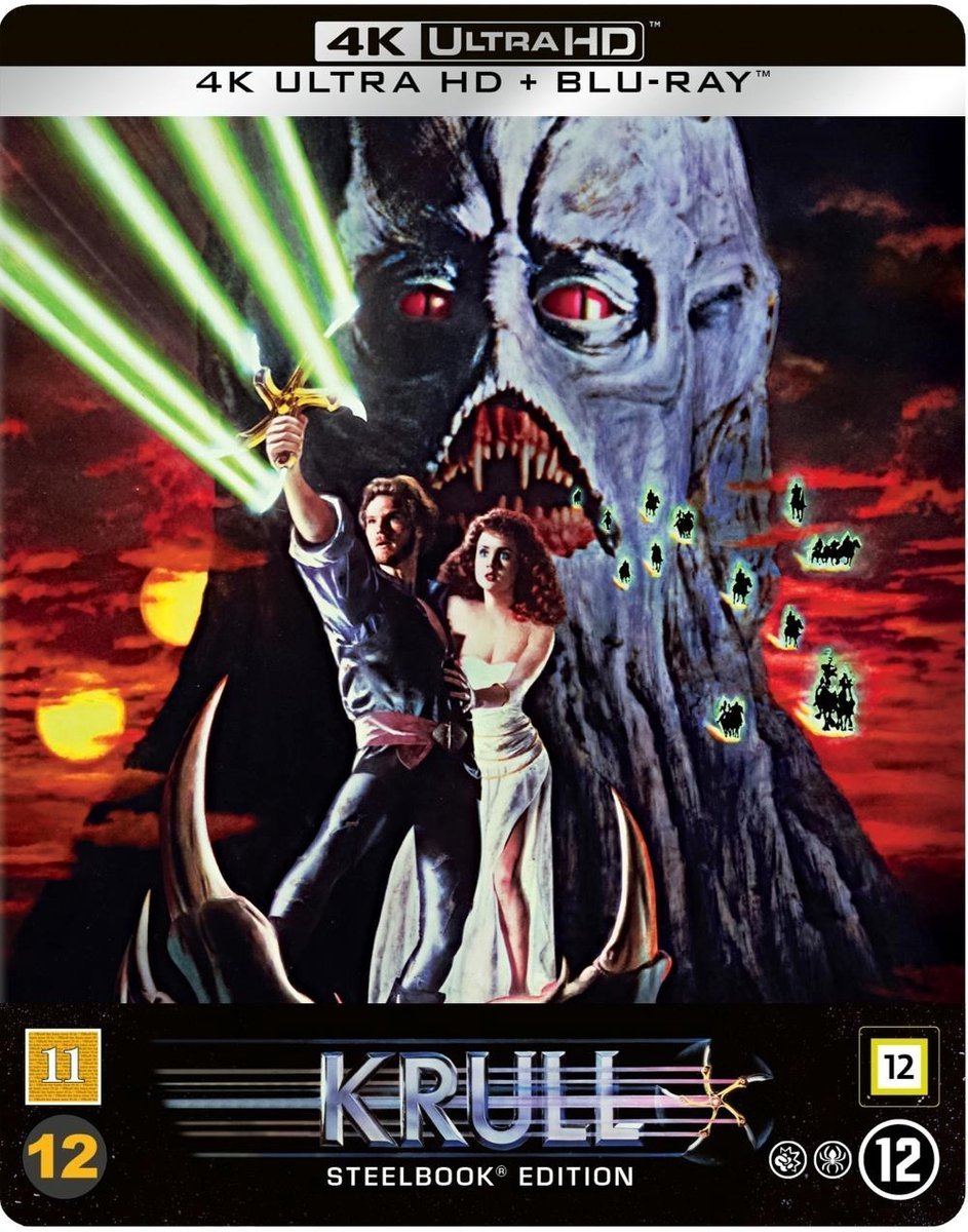 Couverture de 'Krull'. Un homme tient une épée. Une femme est à côté de lui. Un monstre se profile. Le fond est rouge.