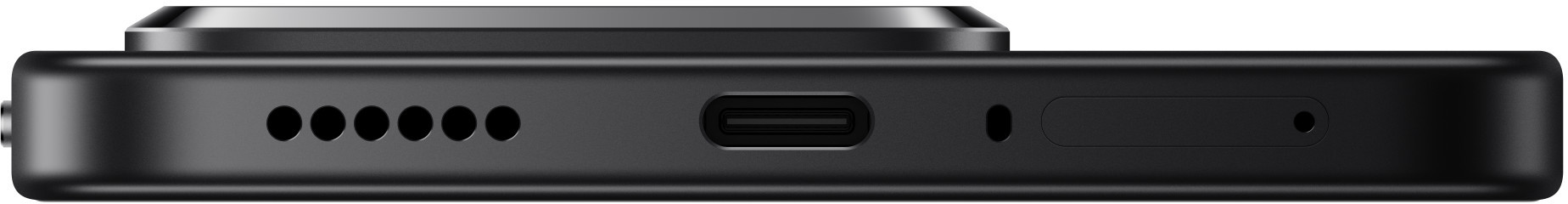 Zbliżenie czarnego urządzenia. Cechy: port USB-C, otwory głośnikowe i mały otwór. Na górze znajduje się obiektyw.