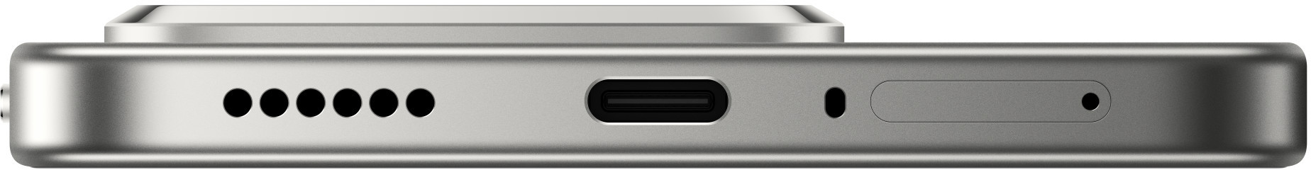 Zbliżenie na krawędź srebrnego urządzenia. Ma szereg małych otworów, port USB-C i inne otwory. Powierzchnia jest gładka.