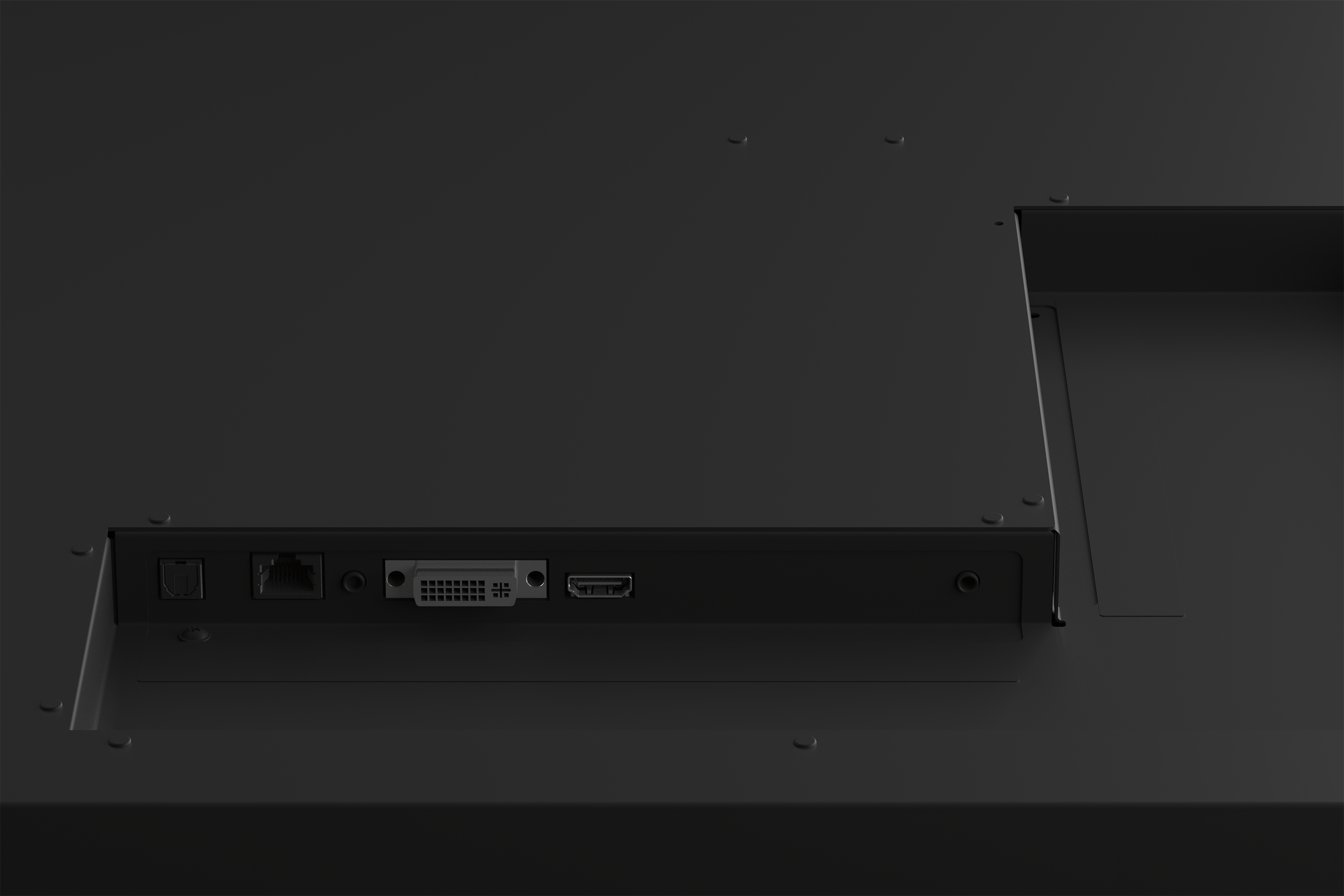 Siyah bir monitörün arka panelinin yakın çekimi. Optik, Ethernet, DVI ve HDMI bağlantı noktalarını içerir.
