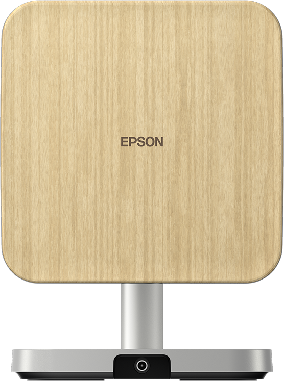 Ein Epson-Gerät mit Holzstruktur, quadratischer Oberseite, silberner Basis und Stiel. Epson-Logo auf der Vorderseite.