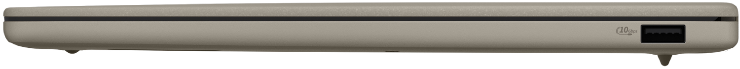 Vista lateral de un portátil beige que muestra un puerto USB, una franja negra y dos pies pequeños.