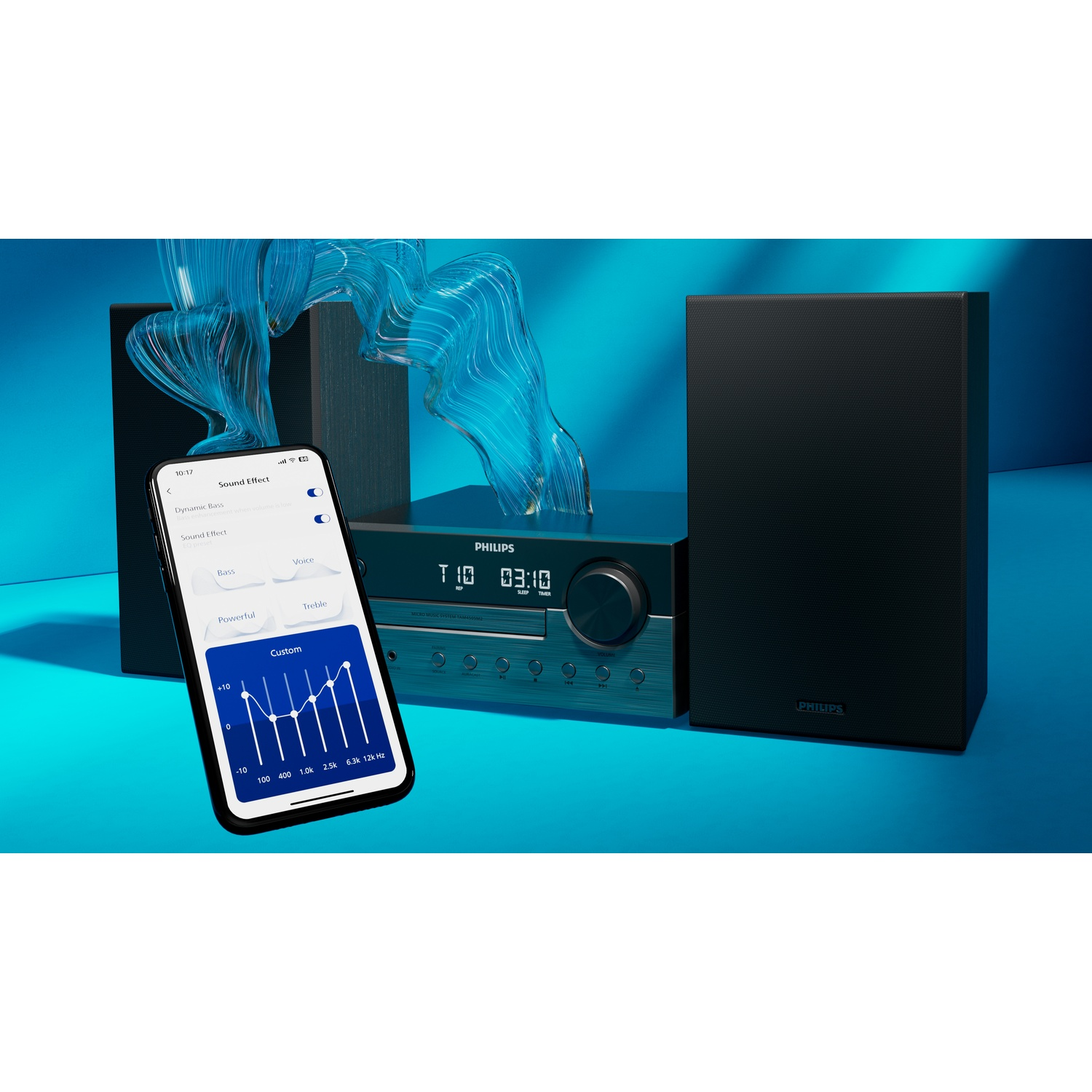 Un sistema stereo Philips con un telefono che mostra le impostazioni audio. Il sistema è nero e blu con uno schermo che mostra un equalizzatore.