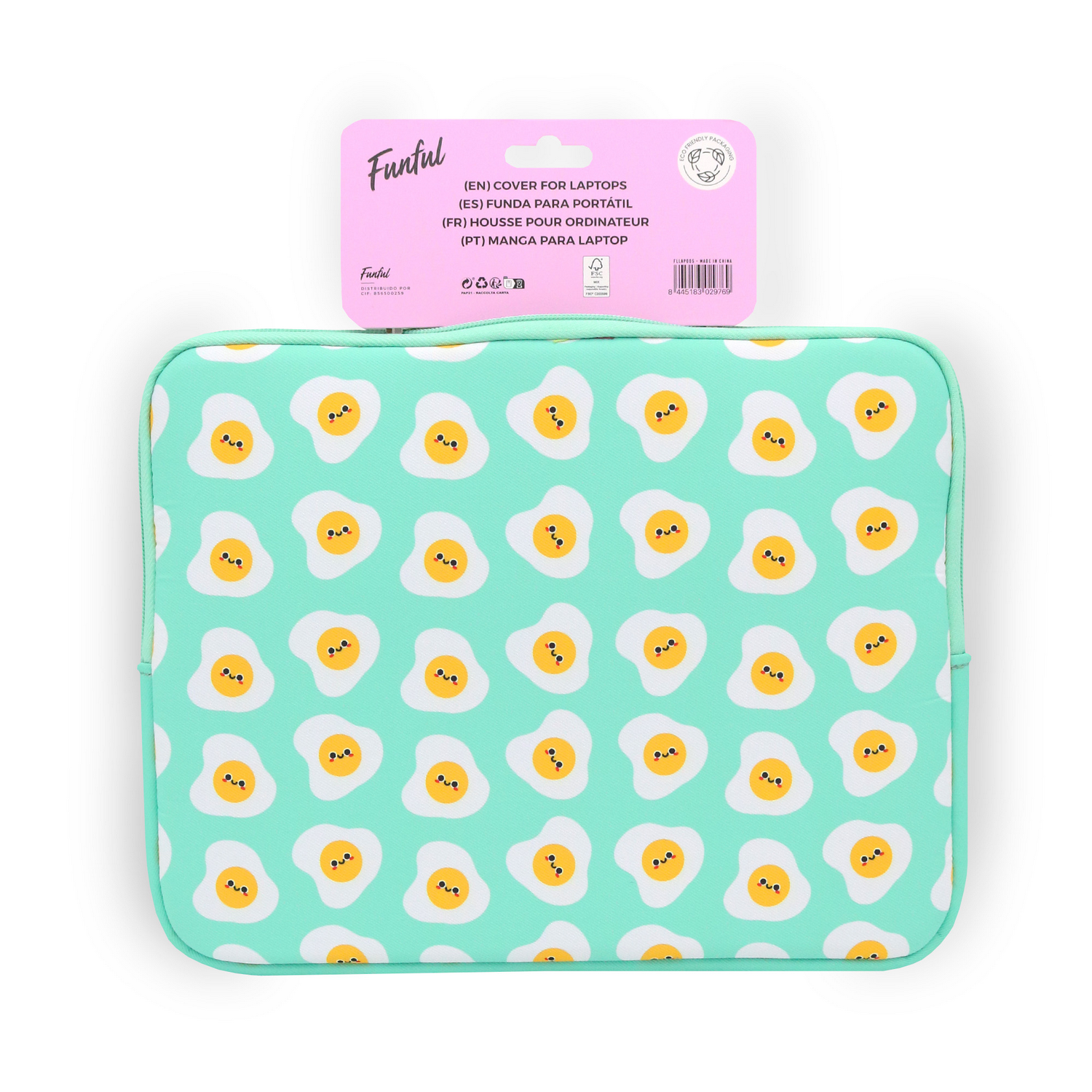 Una funda para portátil con fondo verde claro, cubierta de patrones de huevos fritos sonrientes. Encima hay una etiqueta rosa.