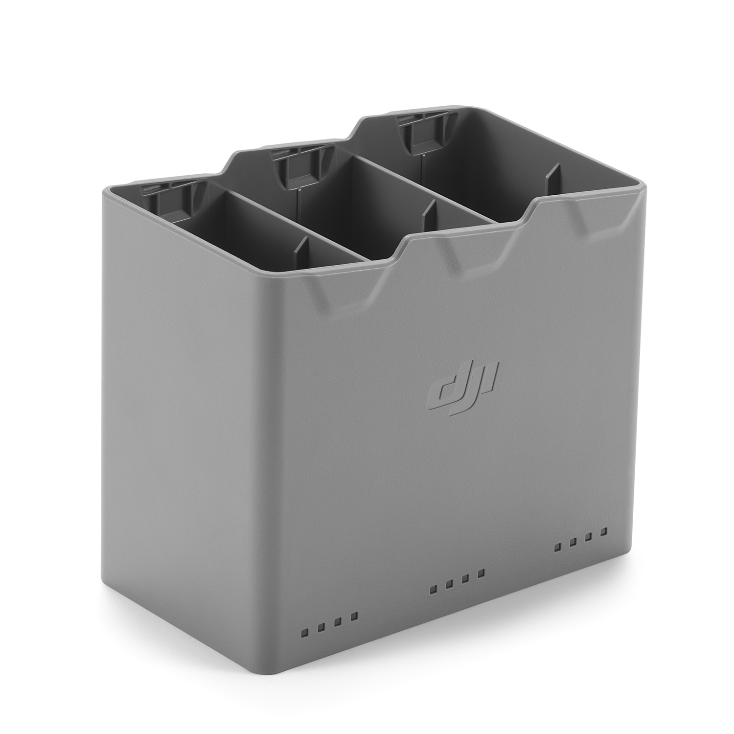 Een grijze plastic DJI batterij oplaadcase, verdeeld in vier compartimenten. Het DJI logo is zichtbaar.