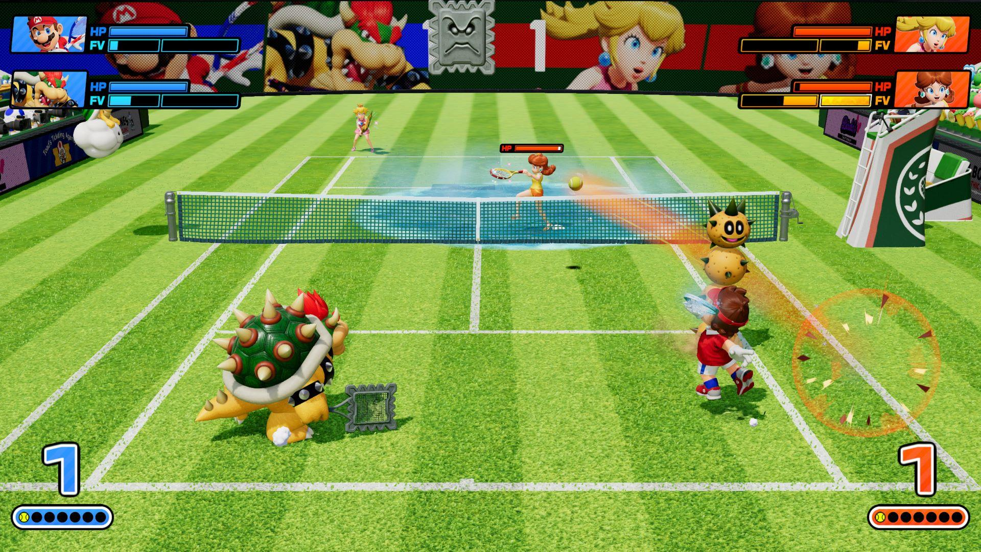 Ein Tennisspiel mit Mario-Charakteren. Bowser, Peach, Daisy und andere spielen auf einem grünen Platz mit Netz.