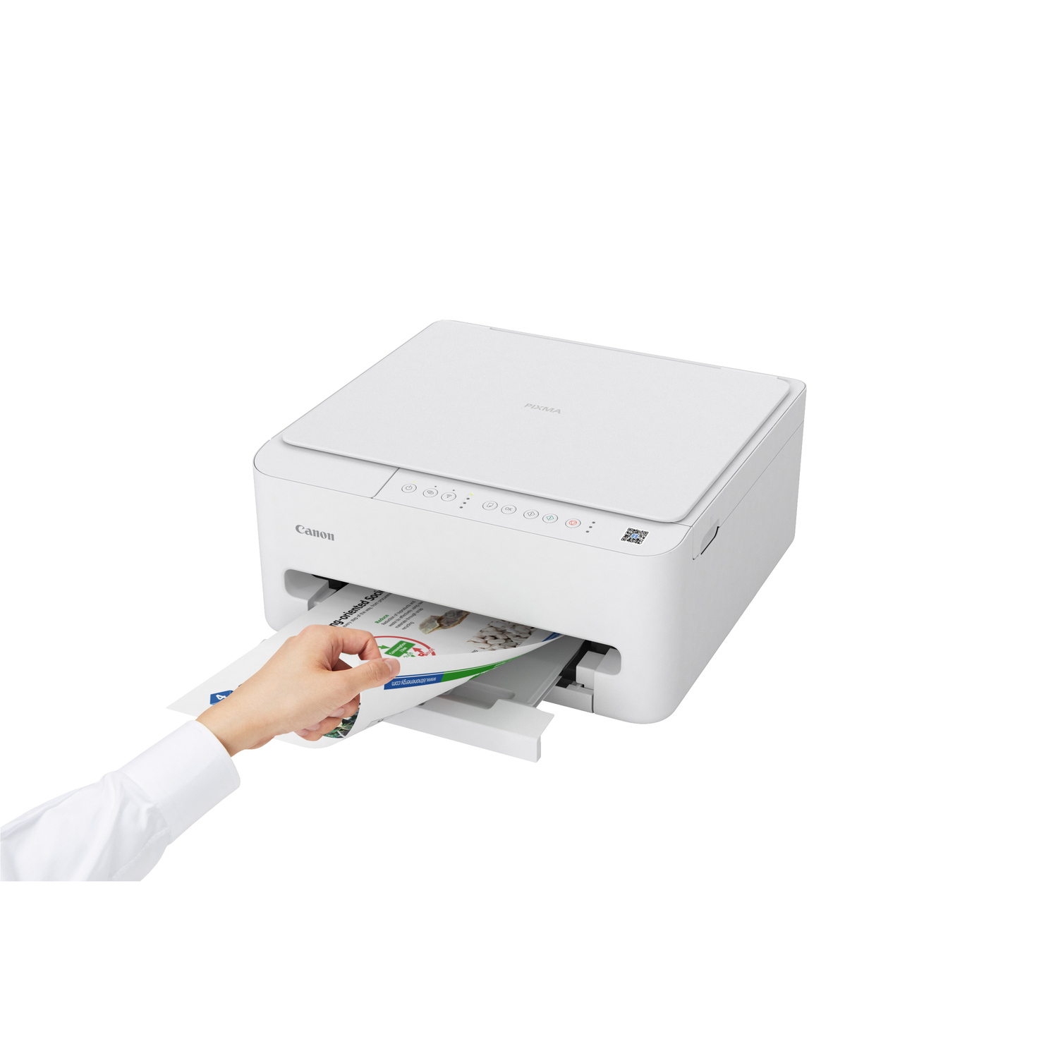 Een witte Canon Pixma-printer met een hand die een afgedrukt papier pakt. De achtergrond is wit.