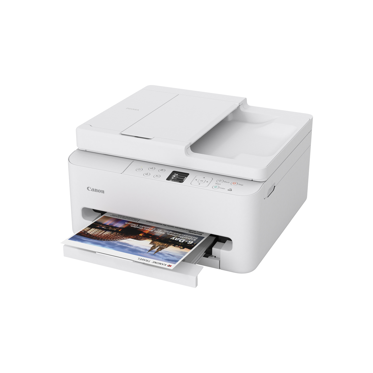 A white Canon printer with a printed brochure in the output tray. The brochure shows a bridge and landscape.
