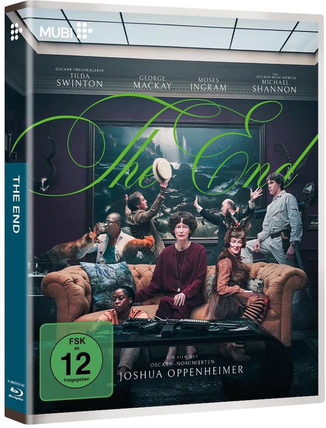 DVD-Cover von "The End". Es zeigt eine Gruppe von Menschen in einem Raum. Tilda Swinton sitzt auf einem Sofa. Der Titel ist grün.