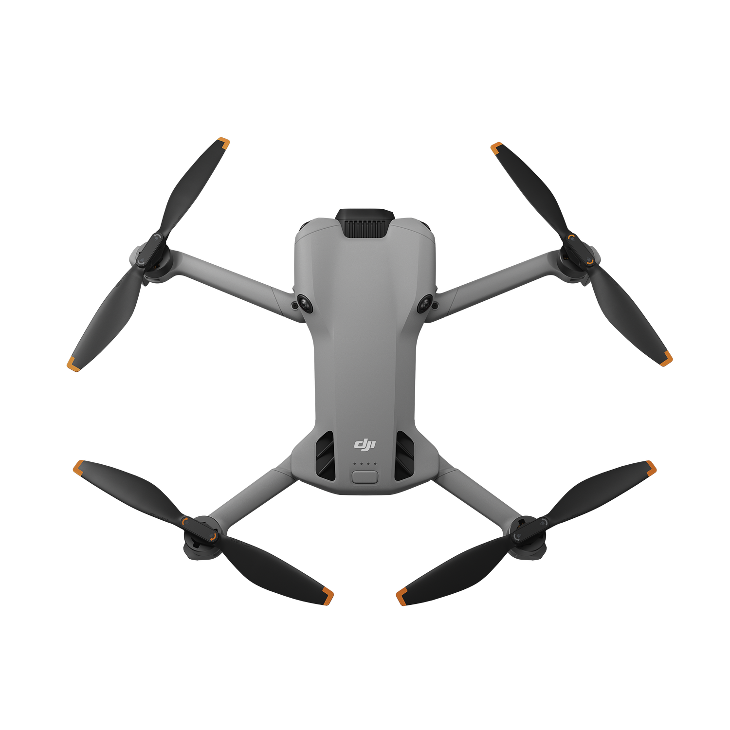 Un dron gris con cuatro hélices negras, puntas naranjas y el logo DJI, sobre un fondo gris.