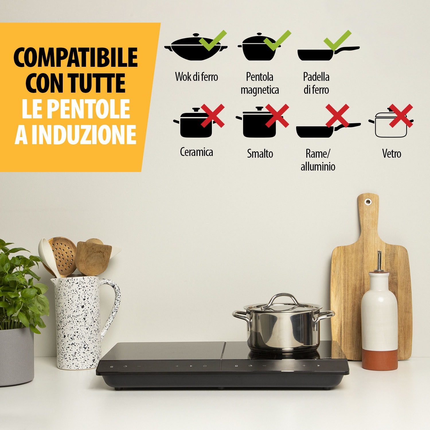 L'immagine mostra un piano cottura a induzione con pentole compatibili. Pentole e padelle in ferro e materiali magnetici sono adatte.